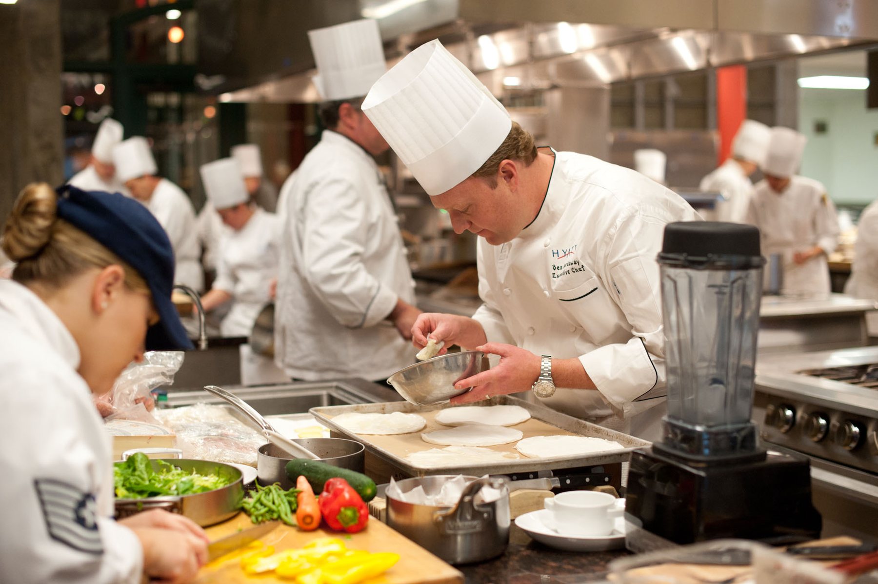 Ben Hardaway working in a professional teaching kitchen setting